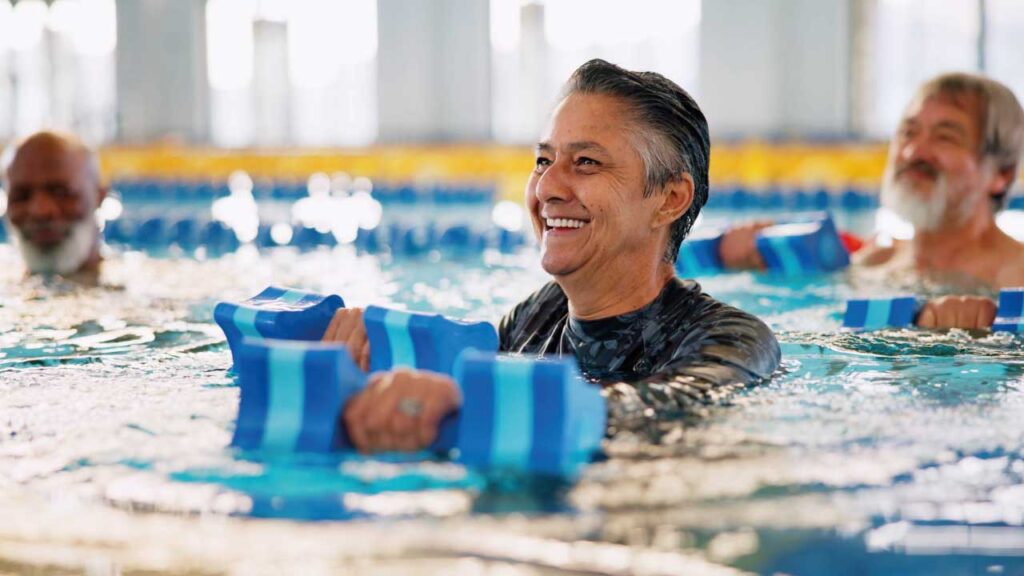 person-doing-physical-exercise-in-the-pool