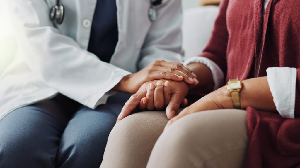 carer giving support with empathy to an older person